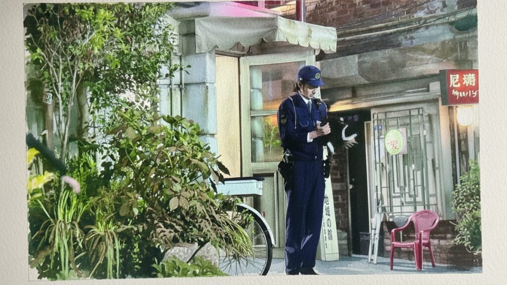 警官の小暮として登場する交番勤務の役どころ